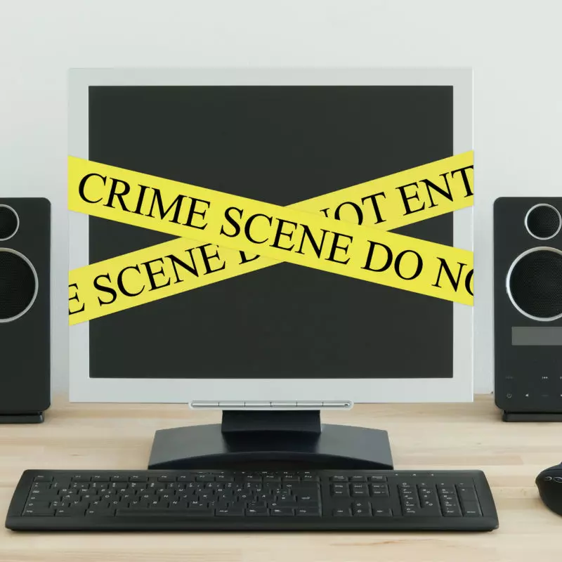 Internet-Crime-Scene-tape-on-computer